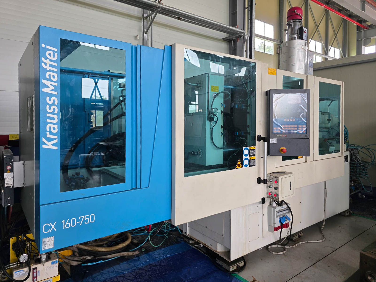 KRAUSS MAFFEI KM 160 - 750 CX 160t vertical injection molding machine (2012) id11265