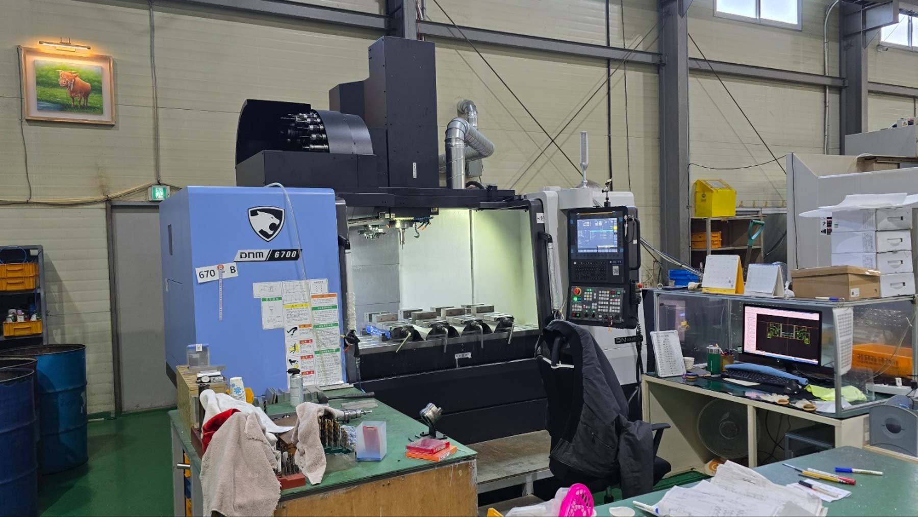 Centre d'usinage vertical  DOOSAN DN SOLUTIONS DNM 6700 (2023) id11145