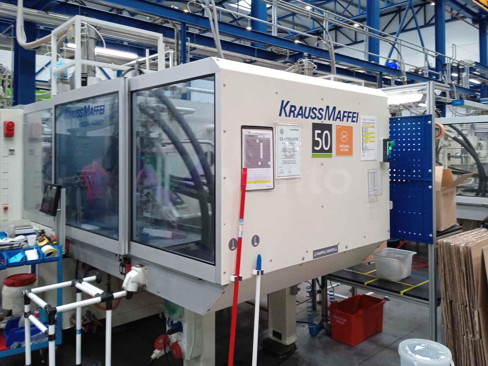 KRAUSS MAFFEI KM 200-1400 C1 200t injection molding machine (2004) id10659